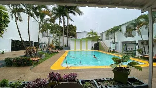Swimming pool and garden of Hotel Waira Suites in Leticia