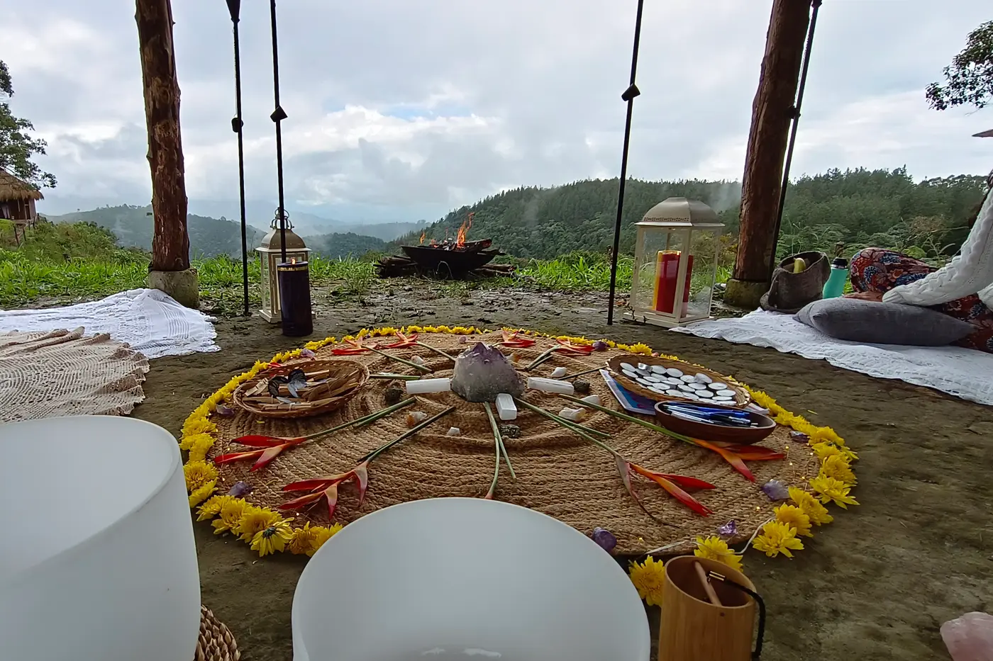 Flower mandala and sound bowls prepared for a wellness ritual