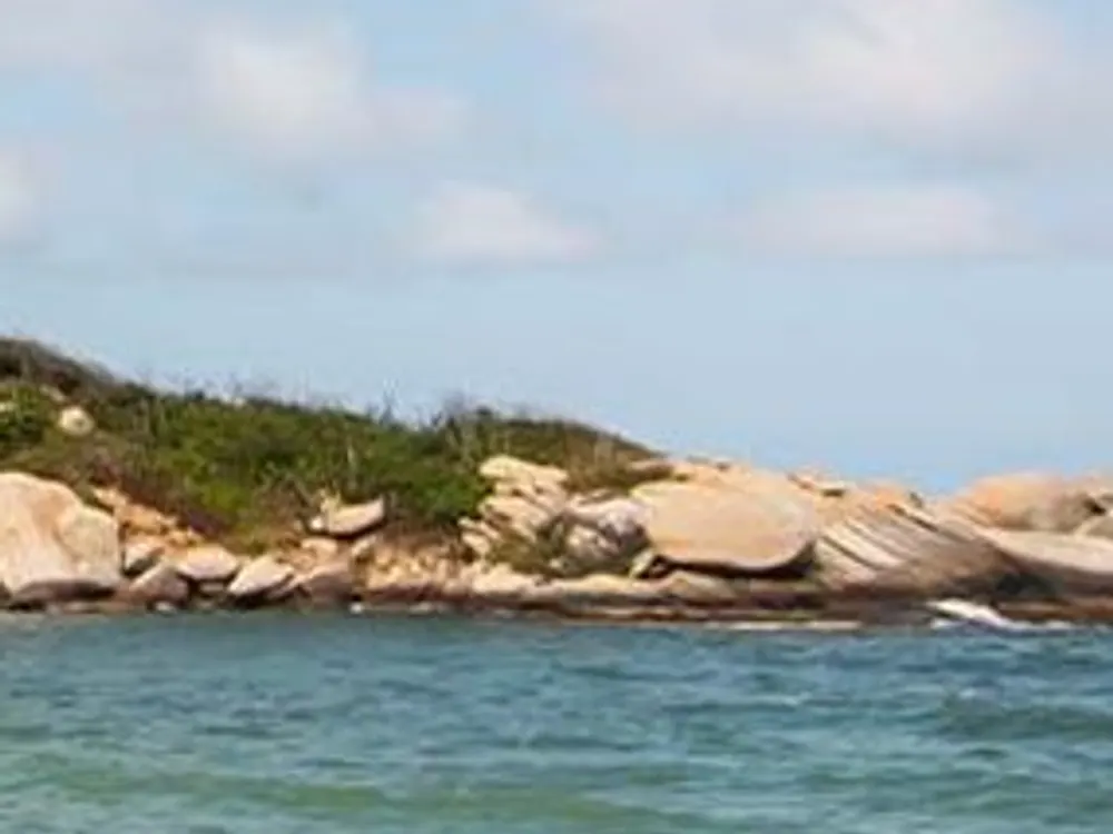 Rocky coast and blue sea in Tayrona Park