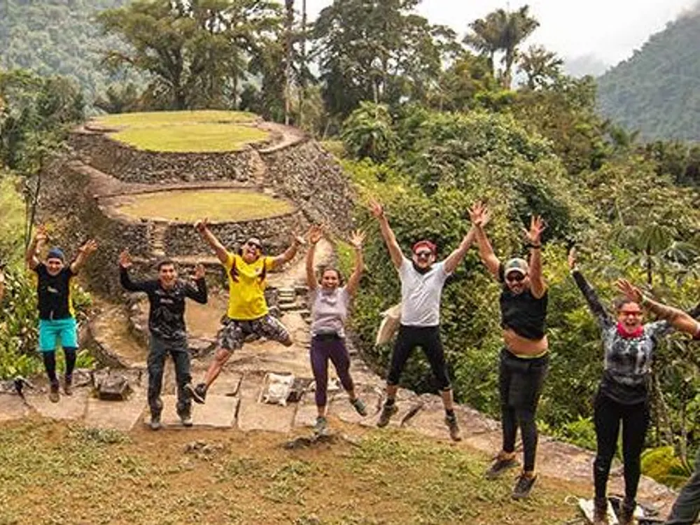 Travelers celebrating on a Lost City terrace