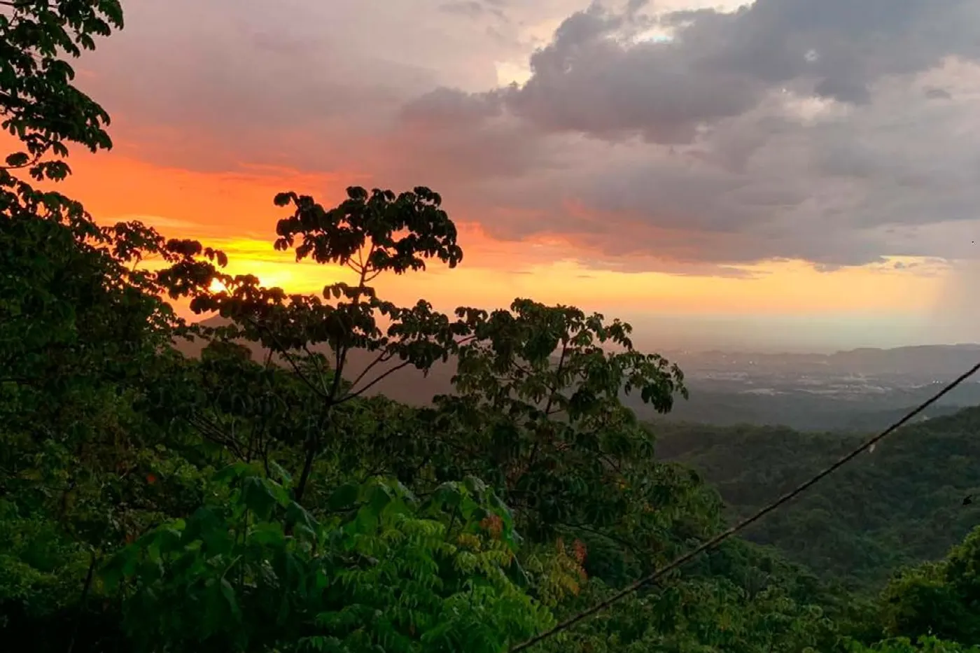 Sunset over the jungle from the mountains of Minca