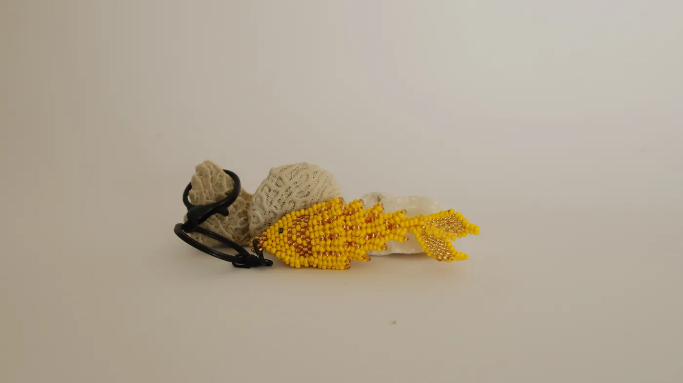 Side view of a beaded fish keychain