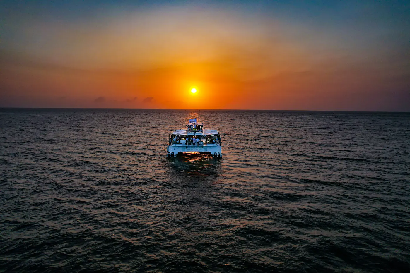 Catamaran sailing at sunset on the Caribbean coast of Colombia